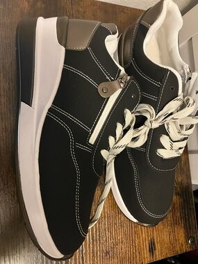 Women’s Black Lace-Up Sneakers with White Accents